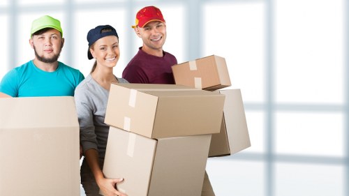 Packed boxes and household furniture ready for a local same day move