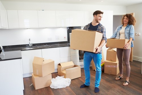 Moving crew planning a relocation with safety checks and training